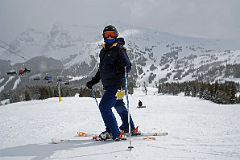 13 Charlotte Ryan At Top Of Wawa With The Eagles And Lookout Mountain Behind At Banff Sunshine Ski Area.jpg
